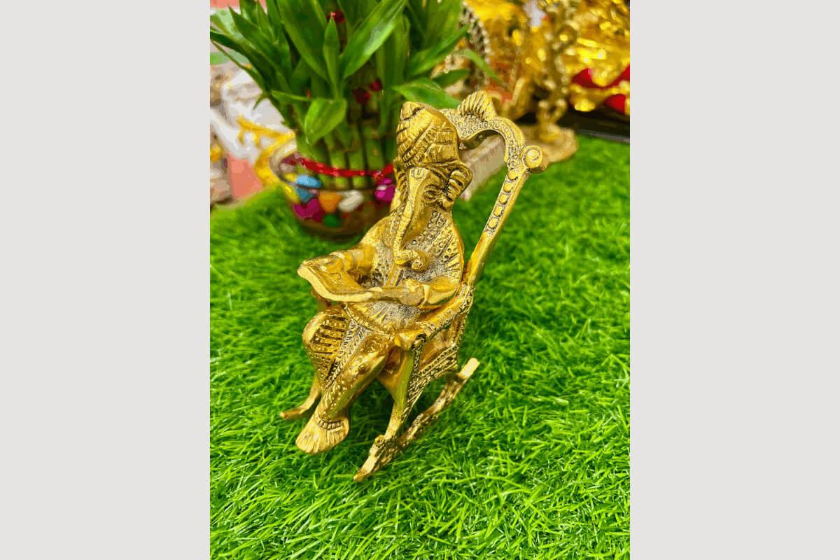 Rocking Chair Ganesha Gold - Puja Celebrations