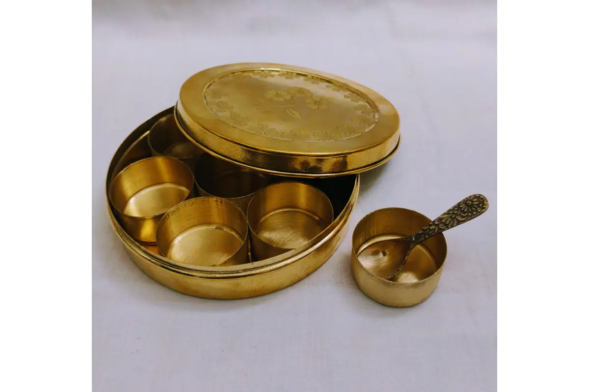 Single removable brass katori spice cup extracted from traditional Anjarai Petti