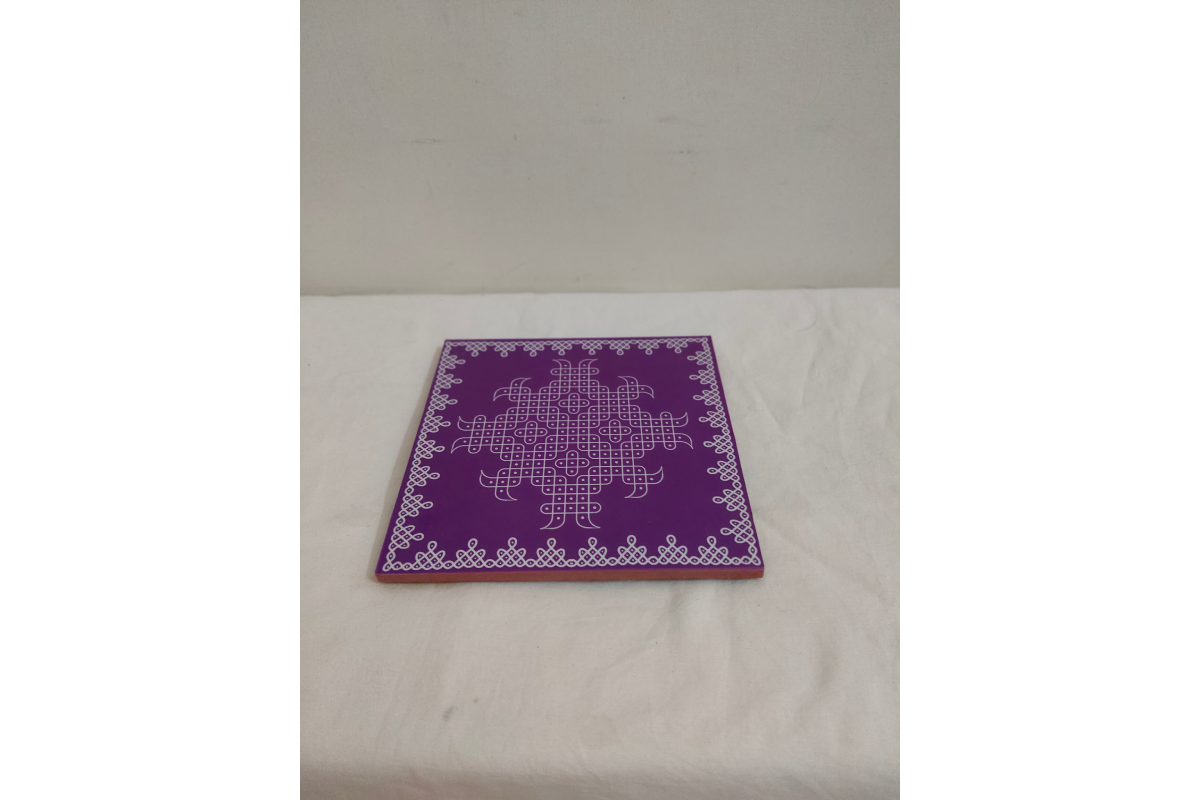 Wipe-clean waterproof lacquer surface demonstration on Kolam Rangoli wooden pooja manai