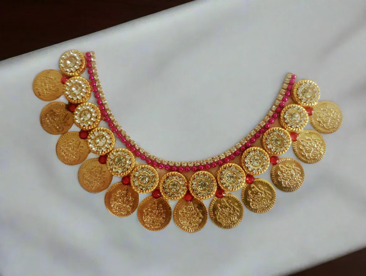 Detailed close-up of mini Kasu Mala coin necklace showcasing intricate Goddess Lakshmi stamps - Puja Celebrations