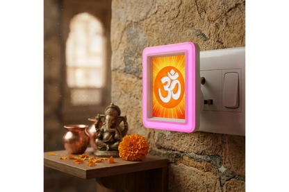 Close-up view of laser engraved Lord Ganesha acrylic panel on LED night lamp