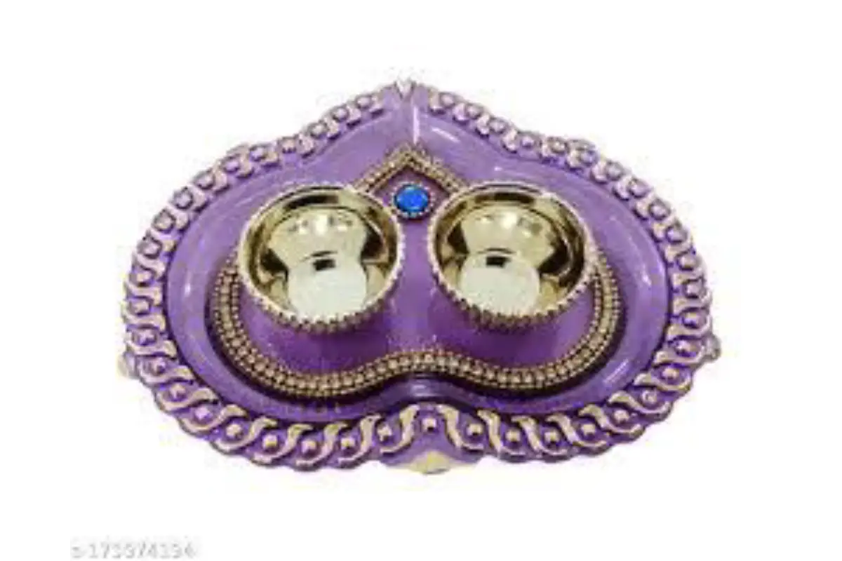 Close-up of Kumkum Holders on Acrylic Platter