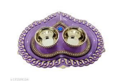 Close-up of Kumkum Holders on Acrylic Platter