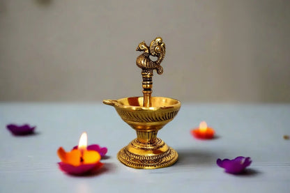 Traditional bird shaped brass finish diya
