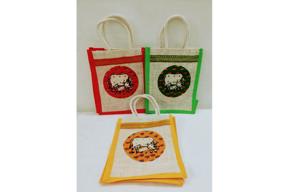 Three small fabric bags with animal designs on a white background