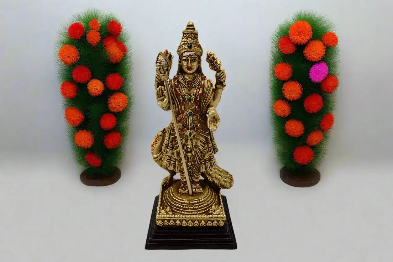 Brass Karthikeya Murugan statue with peacock

