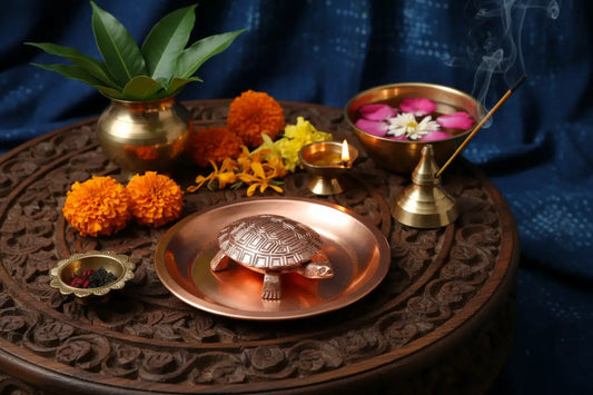 Gold plated metal tortoise with yantra plate