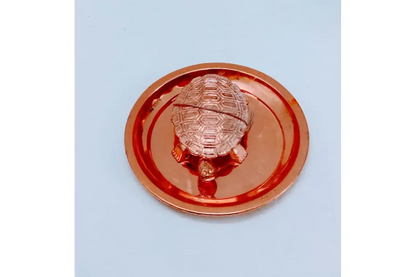 Close up of embossed yantra on metal plate