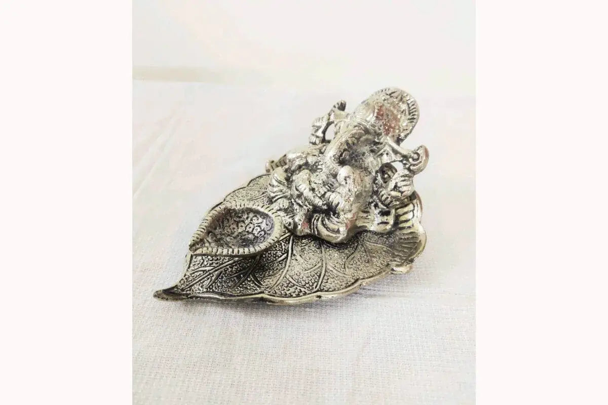 White metal Ganesha diya 4 inch length