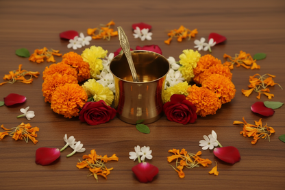 Close up of polished brass udhrani ritual spoon