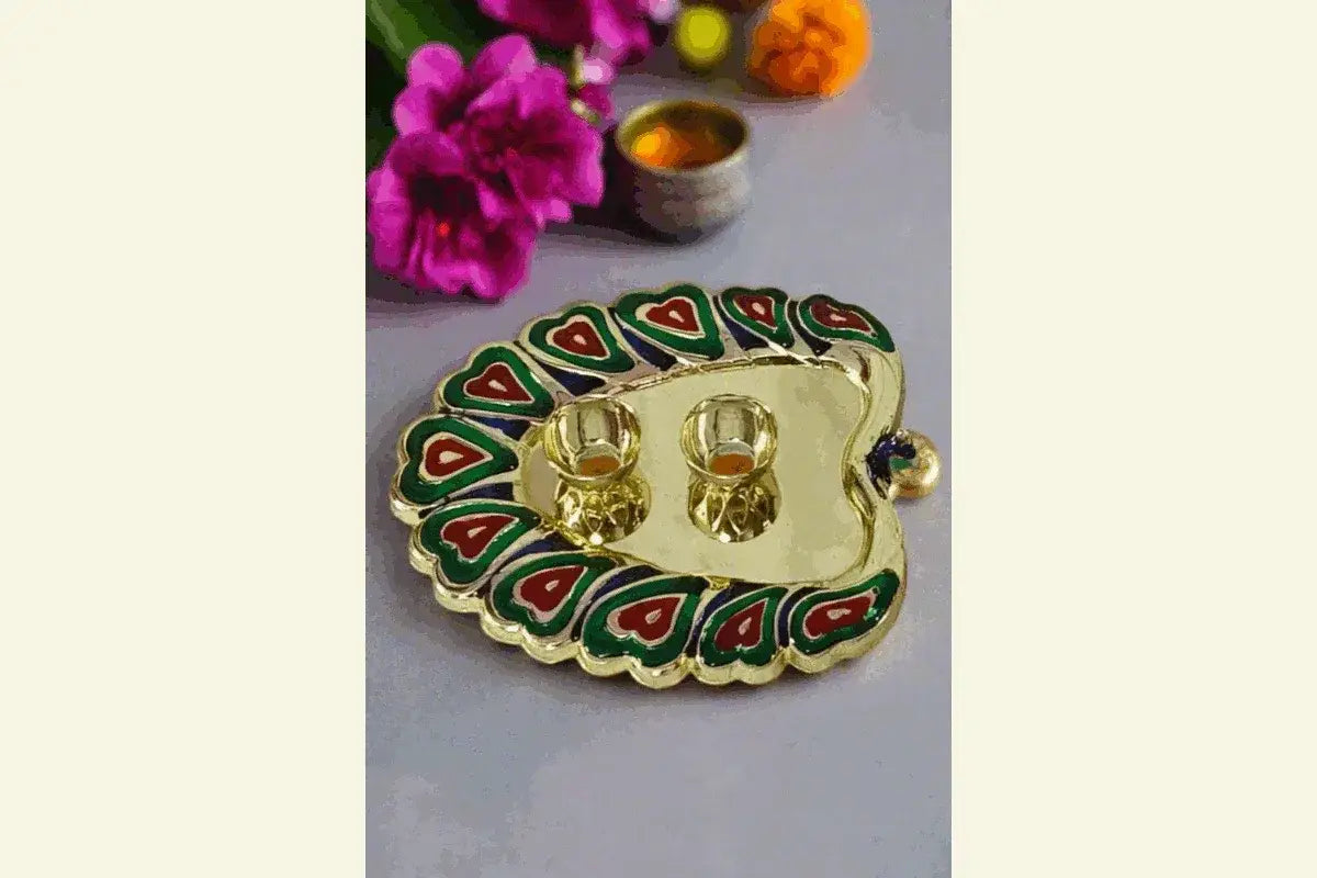 Peacock feather kumkum cups for puja

