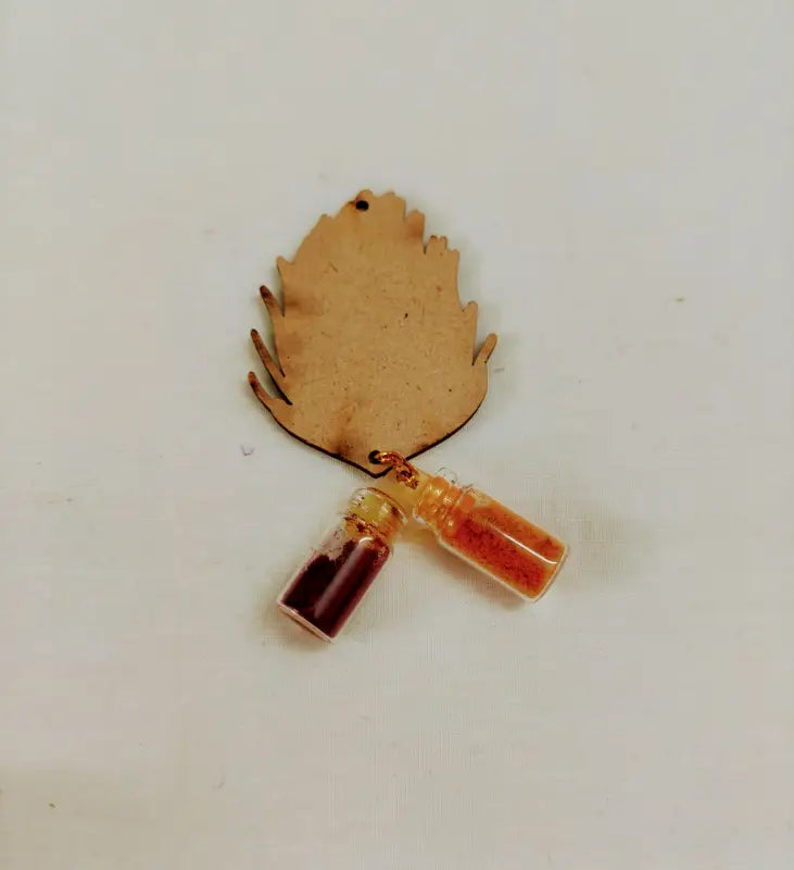 Peacock feather haldi kumkum set with glass bottles for wedding and housewarming return gifts by Puja Celebrations