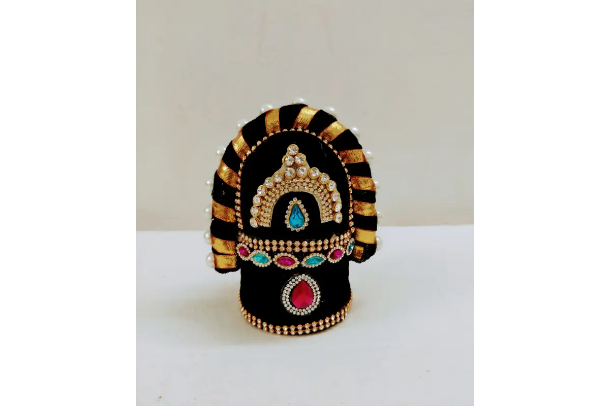Decorative item with black, gold, and multicolor design on a white background