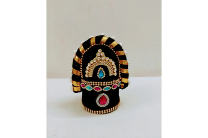 Decorative item with black, gold, and multicolor design on a white background