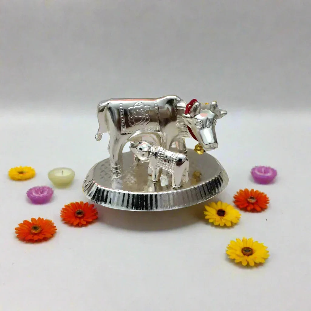 Premium white metal silver plated Gomatha cow and calf return gift 