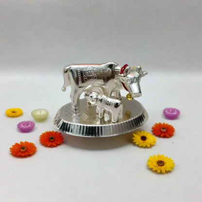 Premium white metal silver plated Gomatha cow and calf return gift 