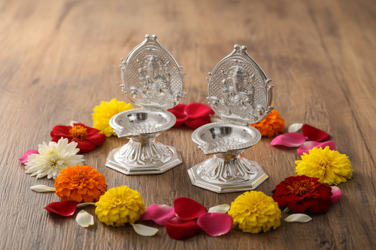 White Metal Ganesh Diya Pair