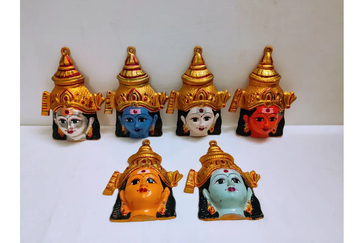 Aarumugam face set displayed as Navaratri golu decor and Varalakshmi puja festival decoration item