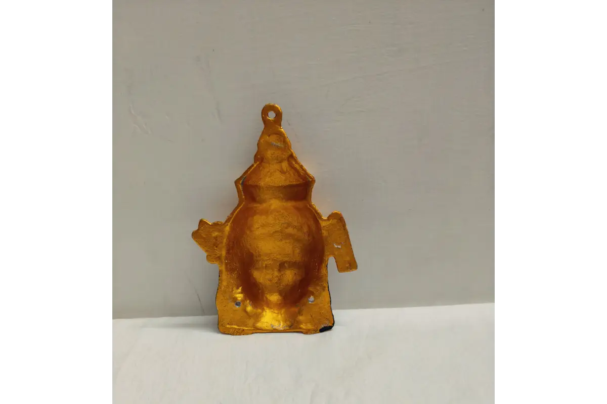 Traditional South Indian puja room decor featuring six faced idol face set