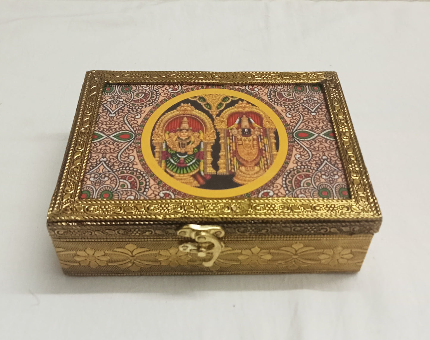 Tanjore print wooden jewelry box neatly packaged in a return gift bag for wedding guests