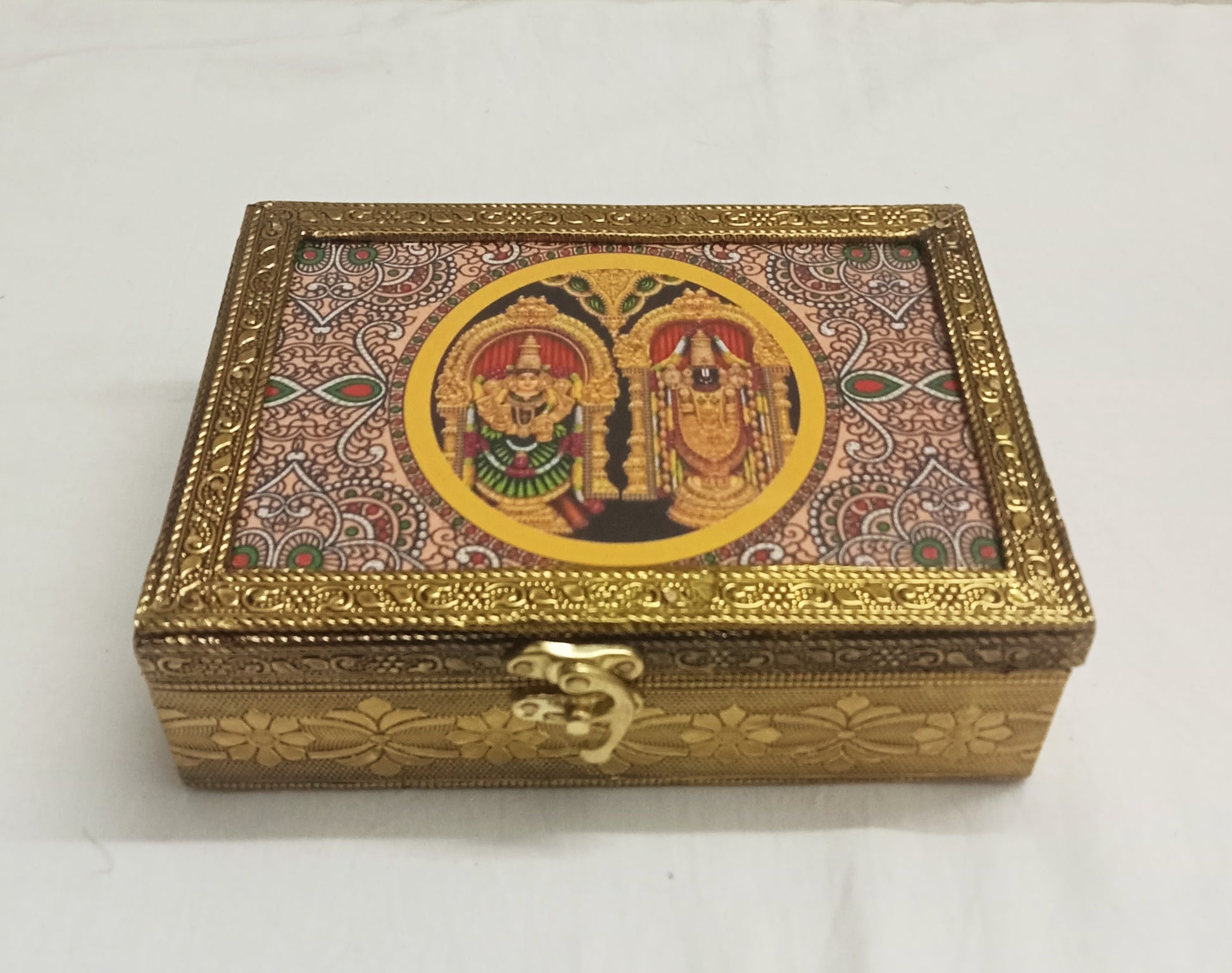 Tanjore print wooden jewelry box neatly packaged in a return gift bag for wedding guests