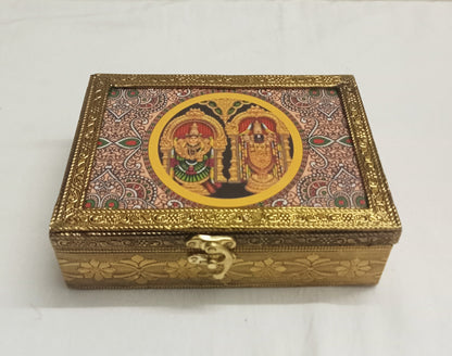 Tanjore print wooden jewelry box neatly packaged in a return gift bag for wedding guests