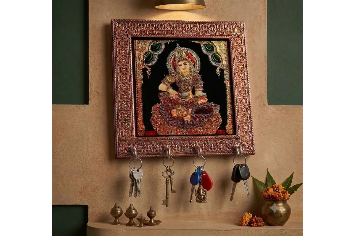 Close-up view of sturdy metal hooks and glossy print on the Annapoorani wooden key hanger - Puja Celebrations
