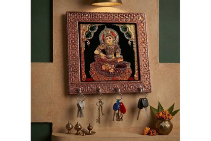 Close-up view of sturdy metal hooks and glossy print on the Annapoorani wooden key hanger - Puja Celebrations
