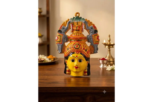 Traditional yellow metal Varalakshmi face with divine elephant arch prabhavali for festival kalash alankaram - PujaCelebrations