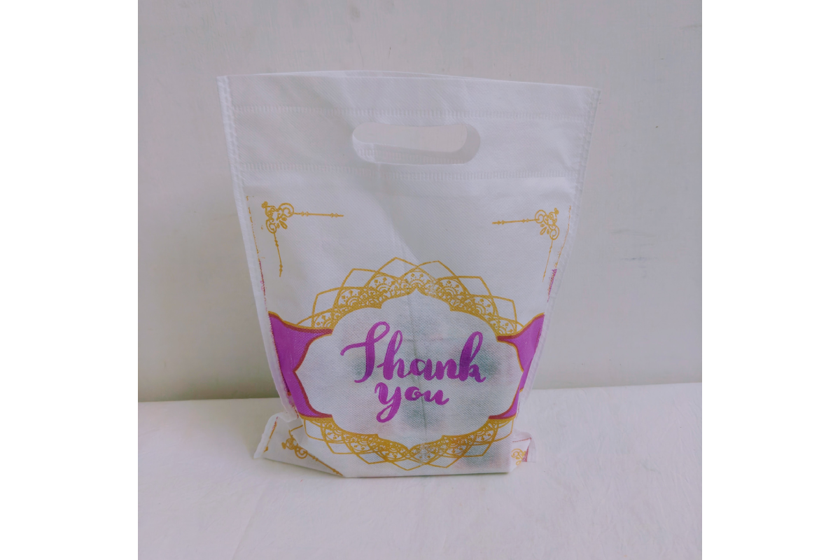 Assorted vibrant color options in non-woven Thank You thamboolam bags available wholesale