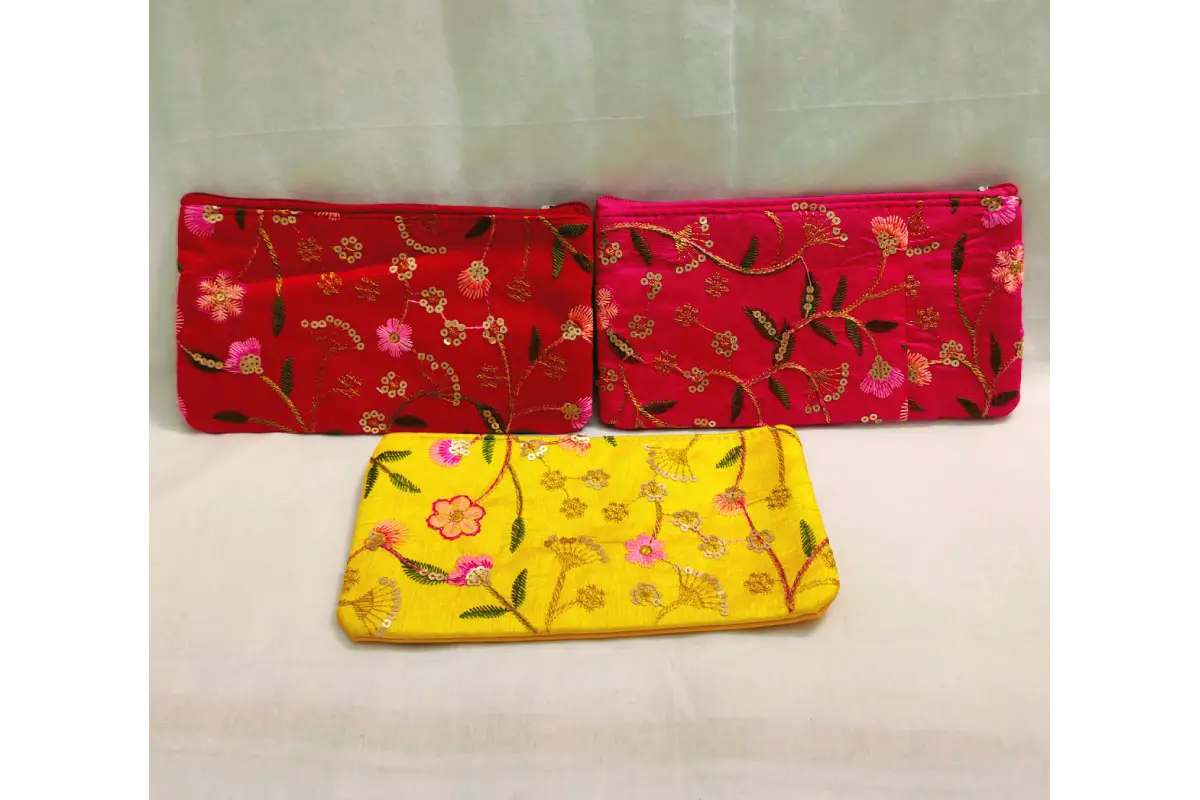 Assorted vibrant color options in printed embroidery purses for wholesale return gift orders