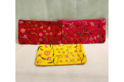 Assorted vibrant color options in printed embroidery purses for wholesale return gift orders