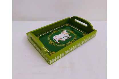 Assorted traditional Pichwai art print variations on handcrafted wooden trays available wholesale