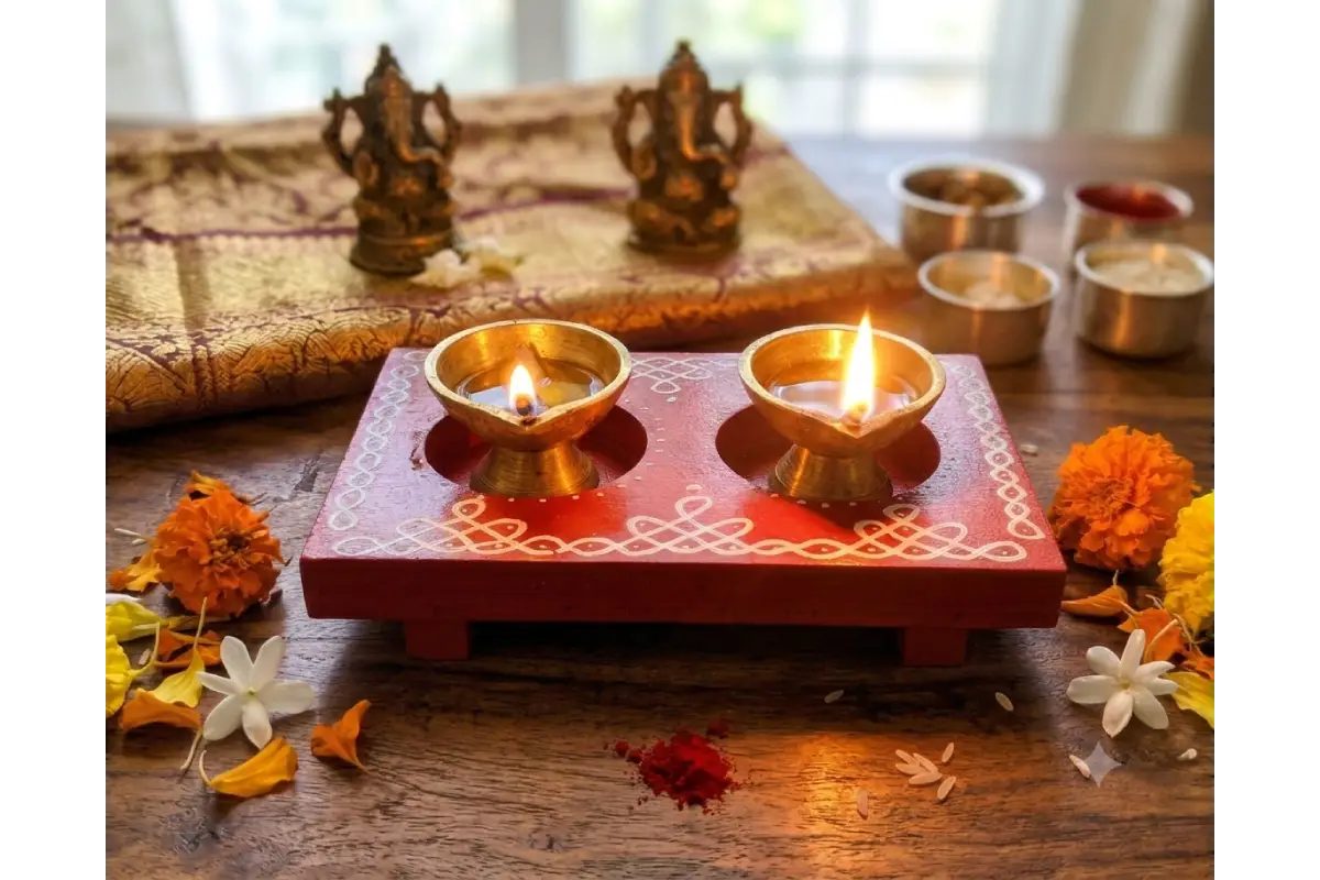Handcrafted wooden diya holder with burning tea light candle for return gifts by Puja Celebrations