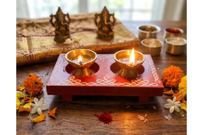 Handcrafted wooden diya holder with burning tea light candle for return gifts by Puja Celebrations