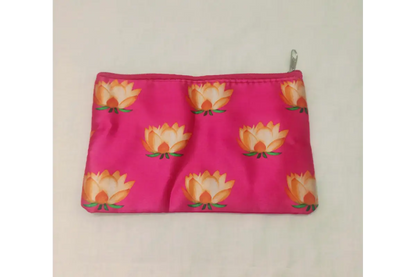 Bulk bundles of Lotus print satin zipper purses packed for wholesale return gift orders at Puja Celebrations