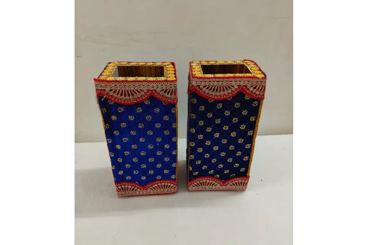 Bulk collection of embroidered wooden banana tree stands at wholesale prices from Puja Celebrations