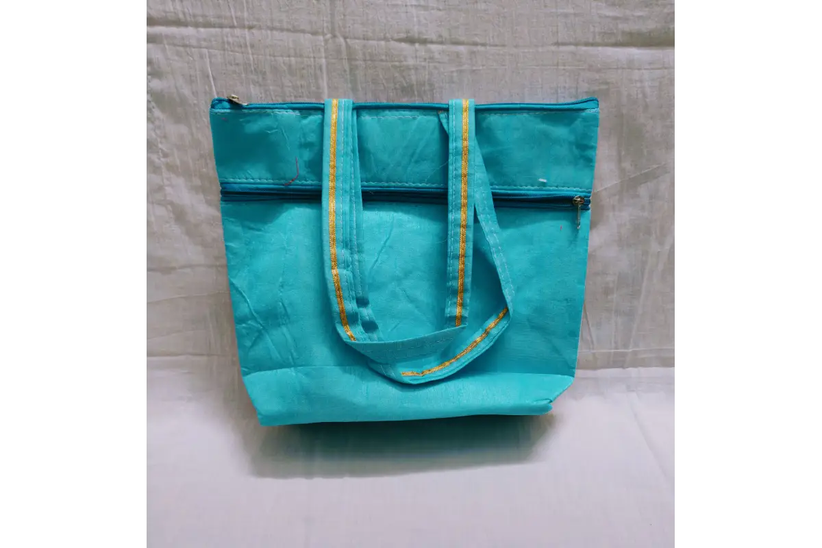 Bulk stack of eco-friendly printed jute handbags packaged for marriage return gift delivery