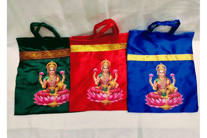 Satin cloth thamboolam bag packed with coconut, blouse bit, and Haldi Kumkum for pooja guests