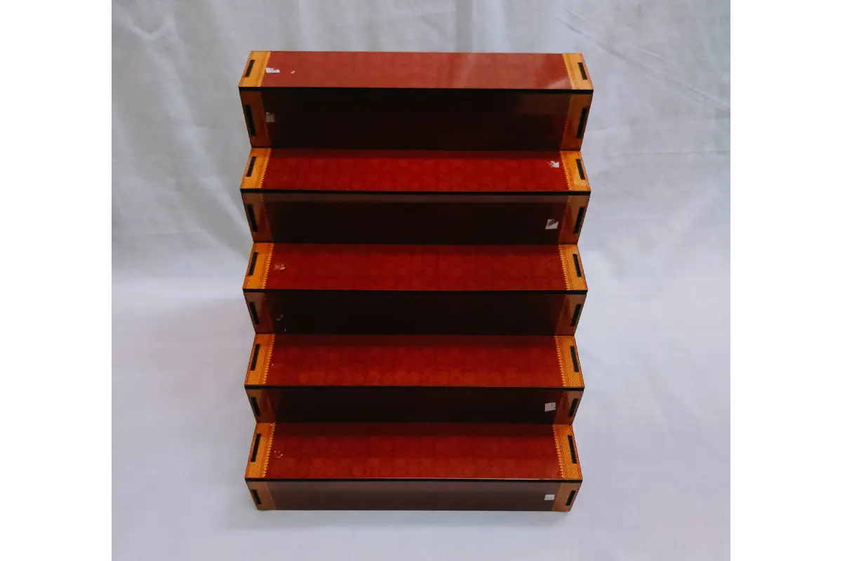 Dismantled DIY flat packed parts of MDF mini Golu stand for easy storage