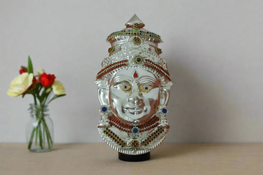 Different sizes of decorated German Silver Lakshmi face idols ranging from six inches to seven.5 inches - Puja Celebrations