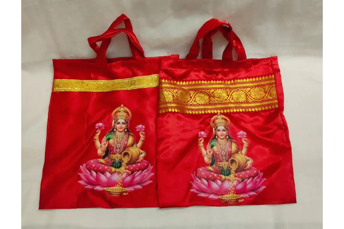 Close-up view of rich glossy satin fabric texture and reinforced edge stitching on return gift bag