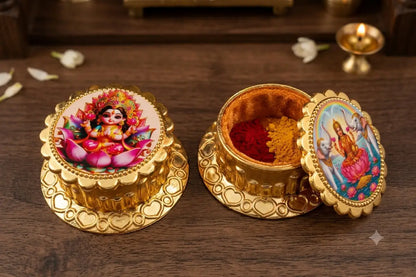 Close-up view of intricate Goddess Lakshmi etching and gold polish on kumkum holder