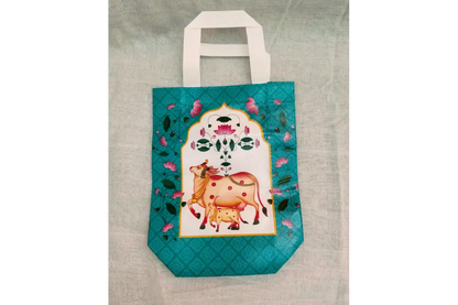 Pichwai Thamboolam bag filled with coconut, blouse piece, and Haldi Kumkum for wedding guests