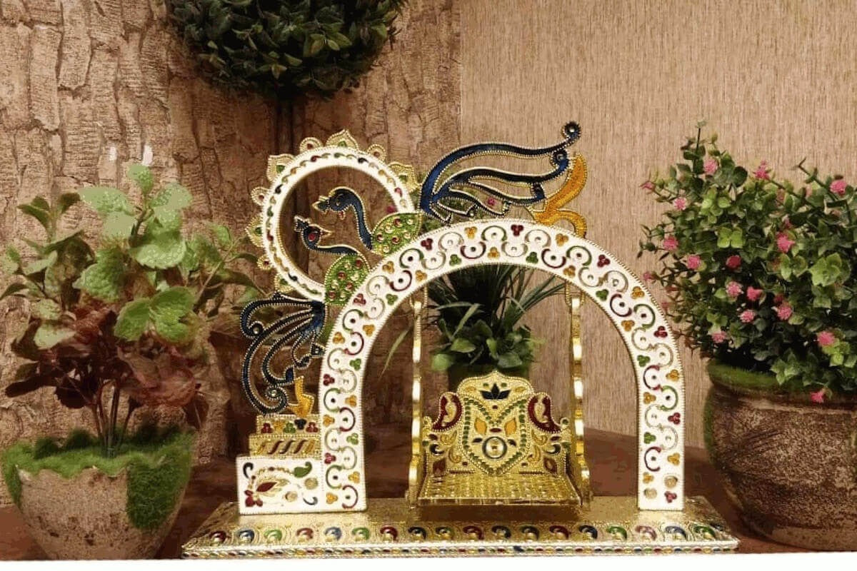 Traditional Wooden Meenakari Jhula for festivals
