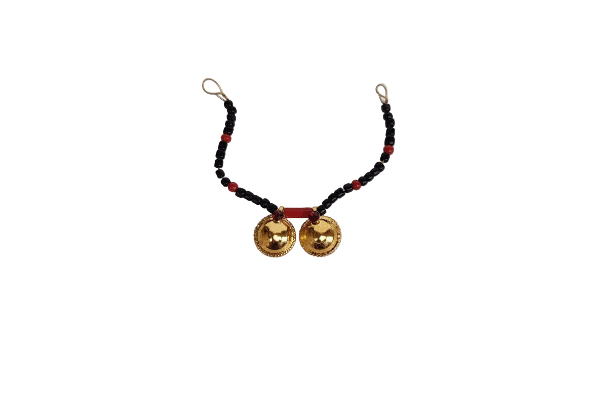 Elegant traditional Karugamani chains arranged in a decorative for pooja - Puja Celebrations