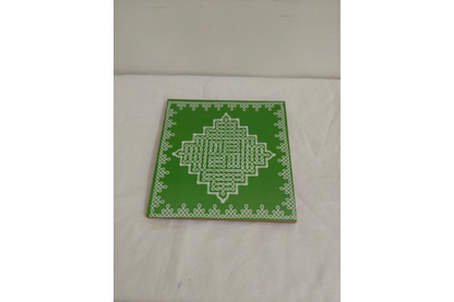Kolam Rangoli wooden manai patla held in hands showing compact size for return gifting
