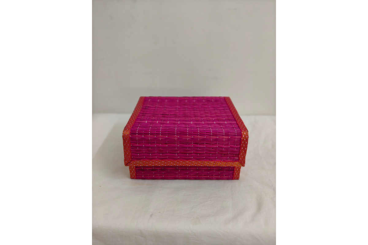 Korai grass gift box completely folded flat for easy bulk storage and shipping