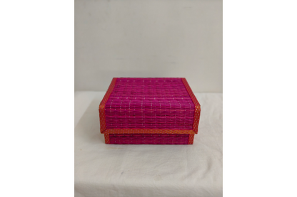 Korai grass gift box completely folded flat for easy bulk storage and shipping