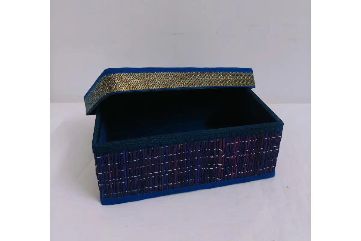 Close-up view of natural woven korai river grass texture and fabric lid trim